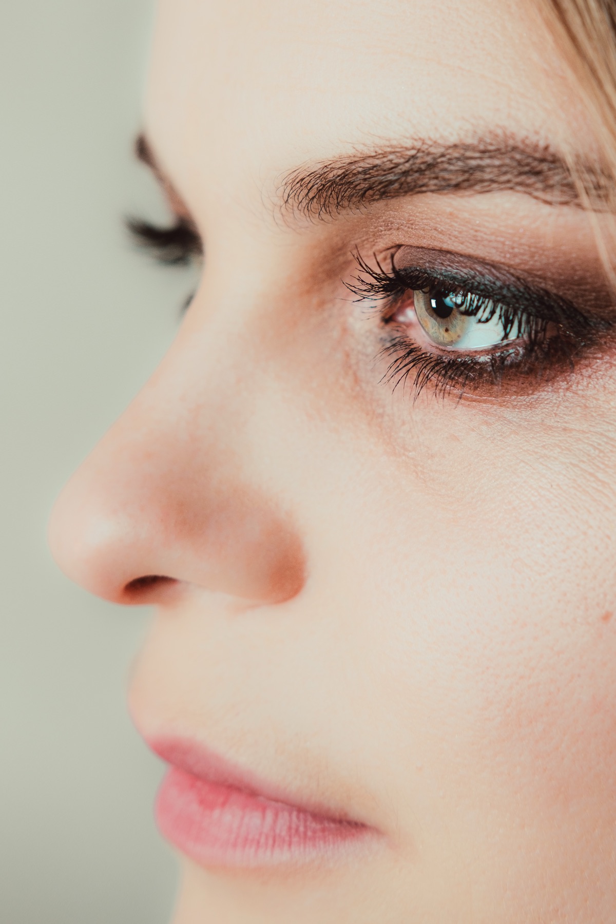 Extreme close-up of a sitter's eye in soft natural light